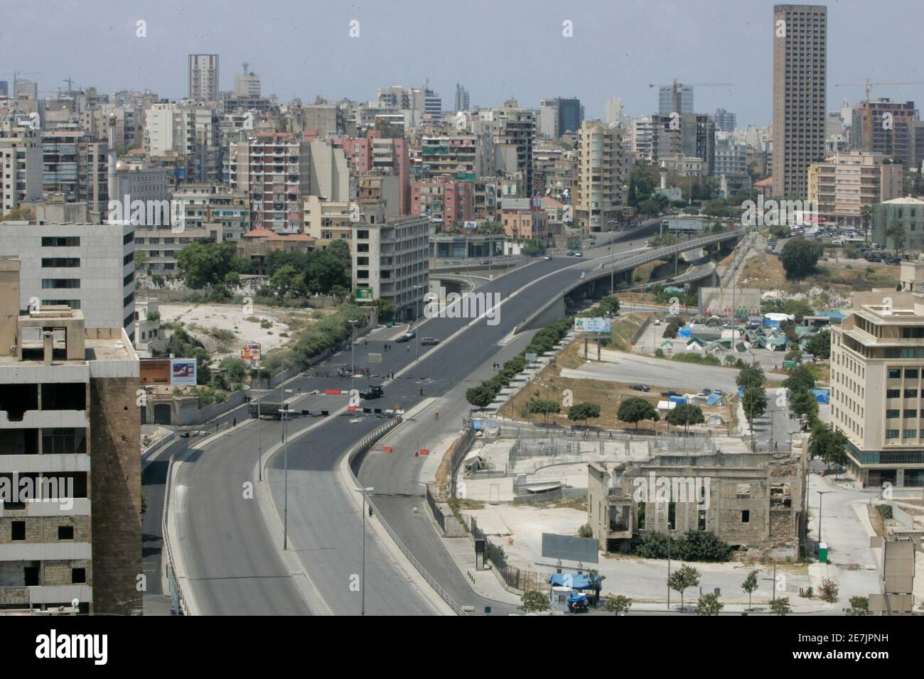 Barricades set up by Hezbollah supporters block Ring bridge, a main road  between East and west Beirut May 8, 2008. Iranian-backed Hezbollah  tightened its grip on Beirut airport on Thursday, pilling pressure