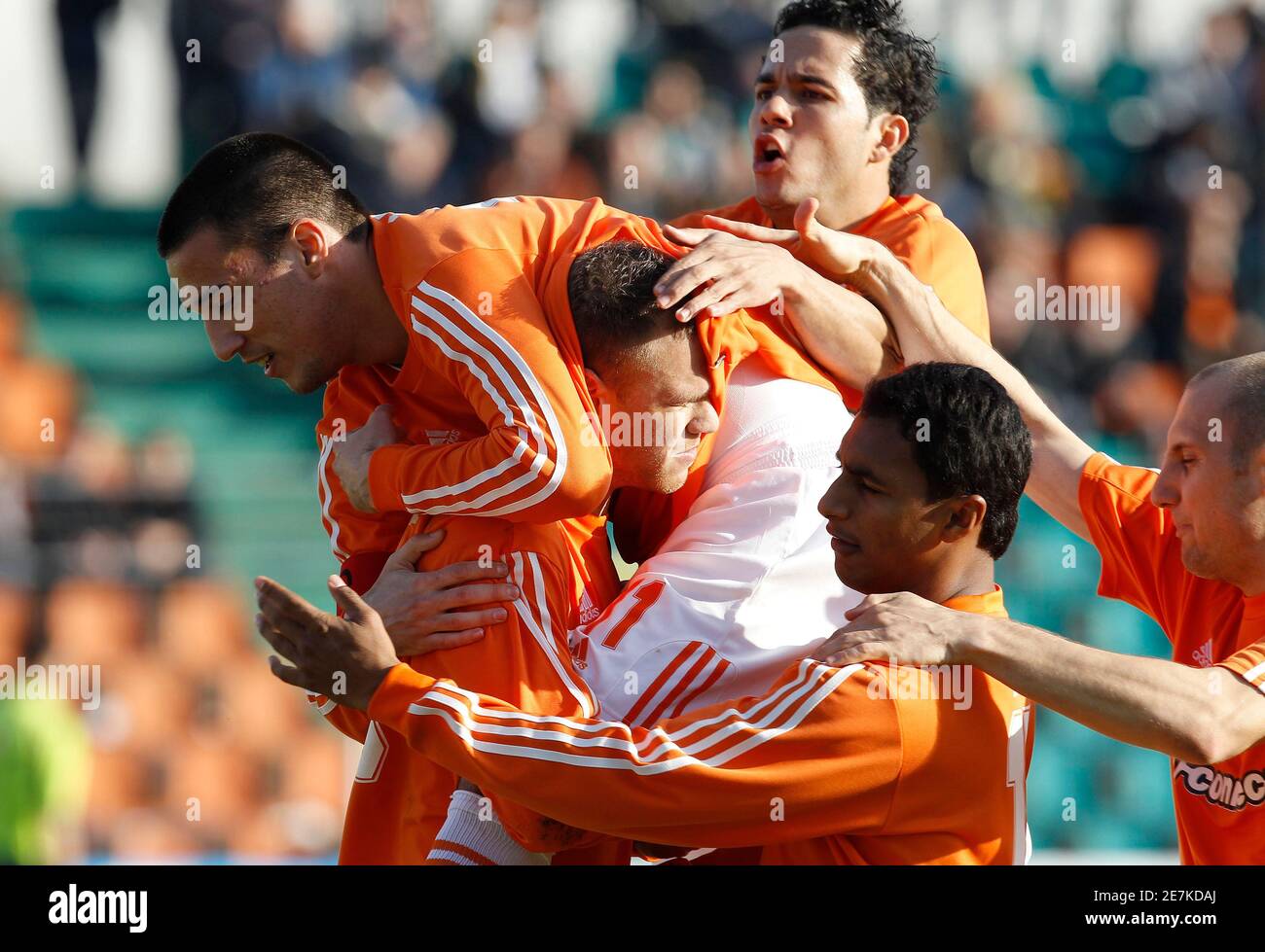 Litex Lovech's Wilfred Niflore (2nd L) celebrates with his team mates after  scoring against Lokomotiv Mezdra during their Bulgarian League soccer match  in the town of Lovetch, some 150km (93 miles) east