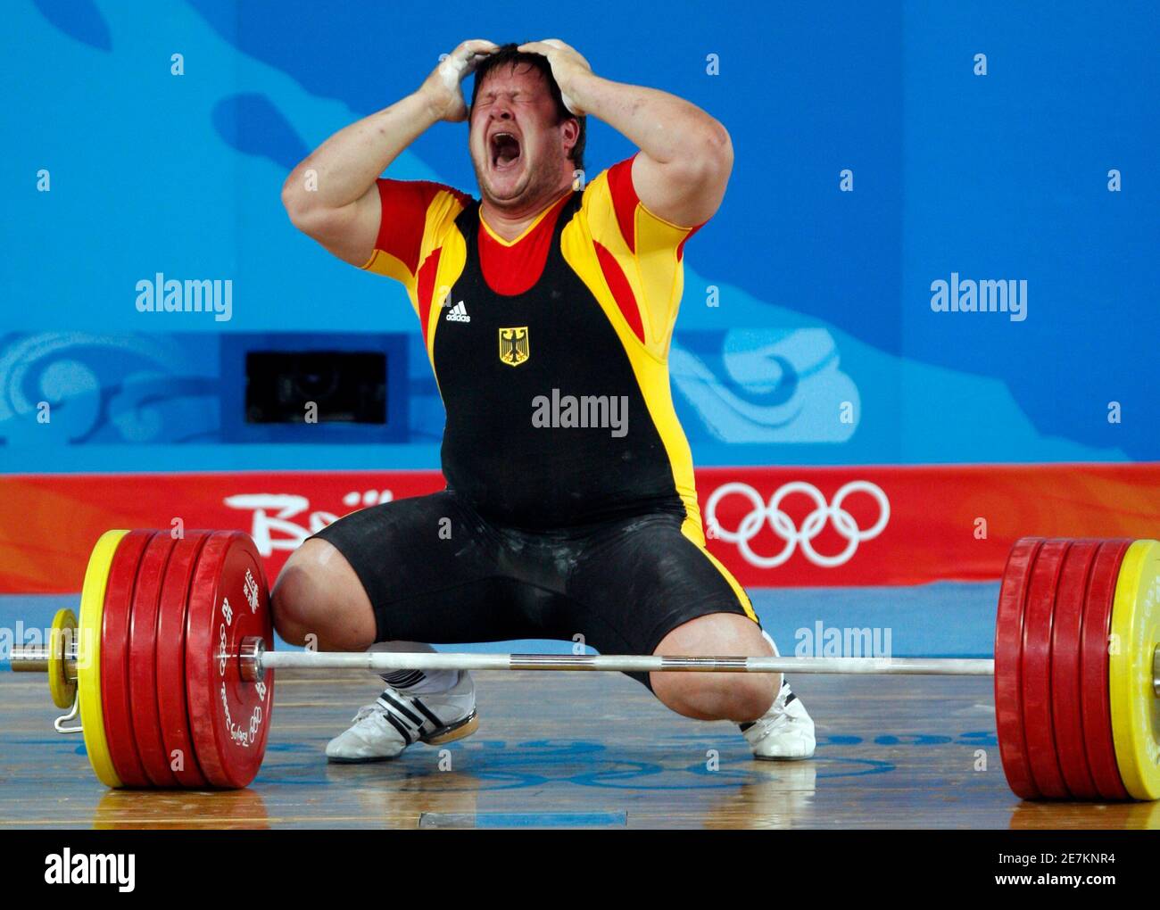 matthias-steiner-of-germany-reacts-during-the-mens-105kg-group-a-weightlifting-clean-jerk-competition-at-the-beijing-2008-olympic-games-august-19-2008-reutersyves-herman-china-2E7KNR4.jpg