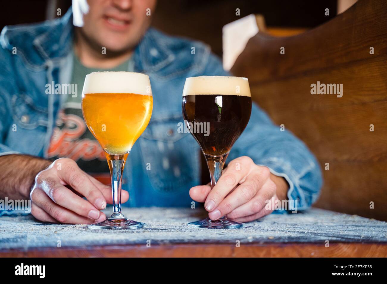 Sommelier present special trappists beer in glasses with foam layer for tasting Stock Photo