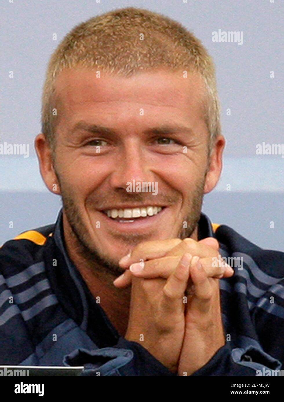 Los Angeles Galaxy's David Beckham watches from a luxury box as his team plays against the Tigres UANL during their World Series of Football soccer match in Carson, California, July 17, 2007.  REUTERS/Danny Moloshok (UNITED STATES) Stock Photo
