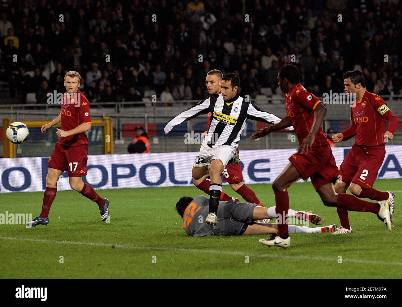Juventus's Marco Marchionni (C) shoots to score the team's second goal against AS Roma during their Italian Serie A soccer match at the Olympic stadium in Turin November 1, 2008. REUTERS/Alessandro Garofalo (ITALY) Stock Photo