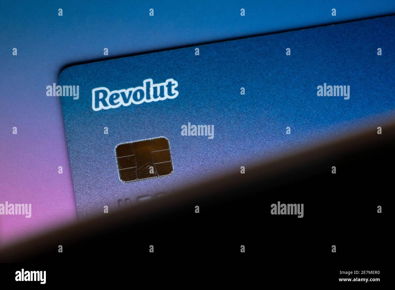 Revolut bank card. Revolut is UK based global financial technology company offering modern banking services with low fees. Stock Photo