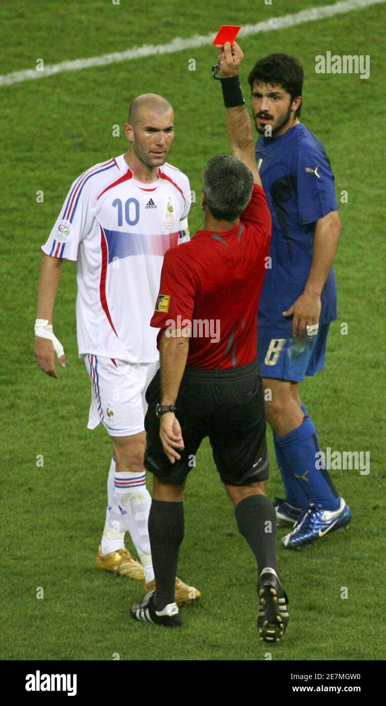 Referee Horacio (C) of France's Zinedine Zidane (L) a red card as Italy's Gennaro Gattuso watches their World Cup 2006 final soccer match against Italy in Berlin July