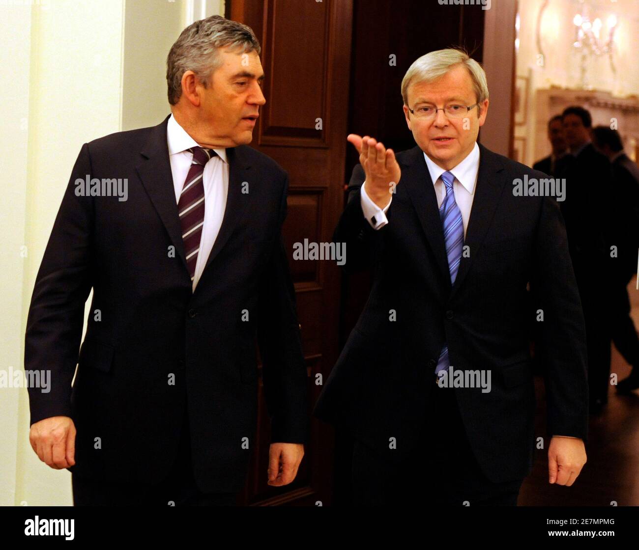 British Prime Minister Gordon Brown (L) walks with Australian Prime Minister Kevin Rudd after a bilateral meeting at the Ambassador's Residence, in advance of the Summit on Financial Markets and the World Economy, in Washington November 14, 2008.    REUTERS/Mike Theiler (UNITED STATES) Stock Photo