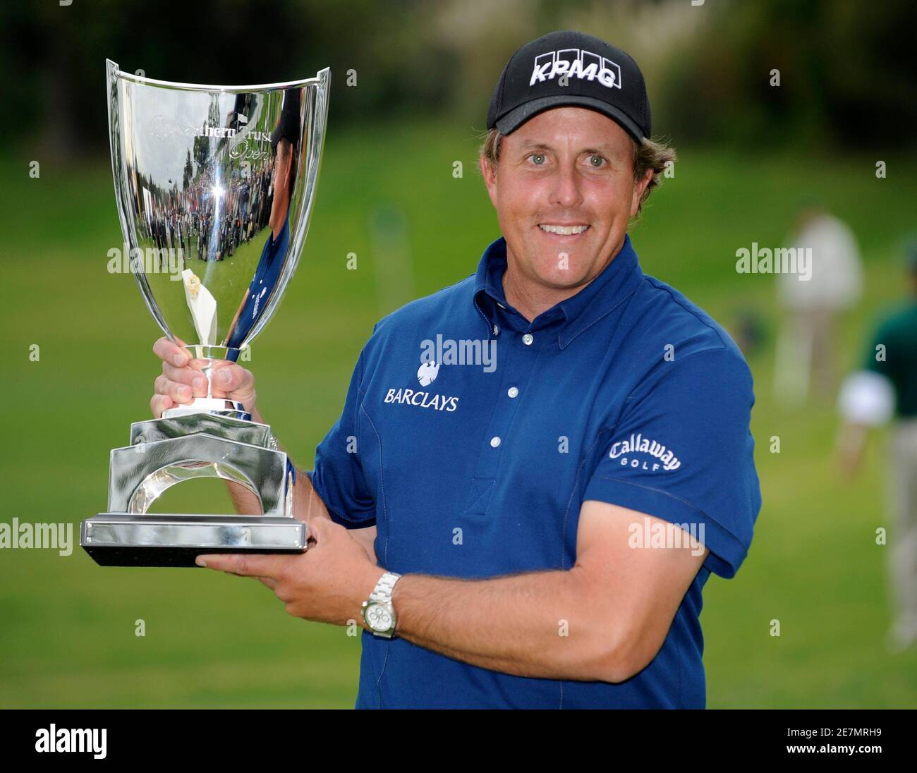 Golfer Phil Mickelson of the U.S. celebrates his victory after winning the Northern Trust Open golf tournament trophy in the Pacific Palisades area of Los Angeles February 22, 2009. REUTERS/Gus Ruelas (UNITED STATES) Stock Photo
