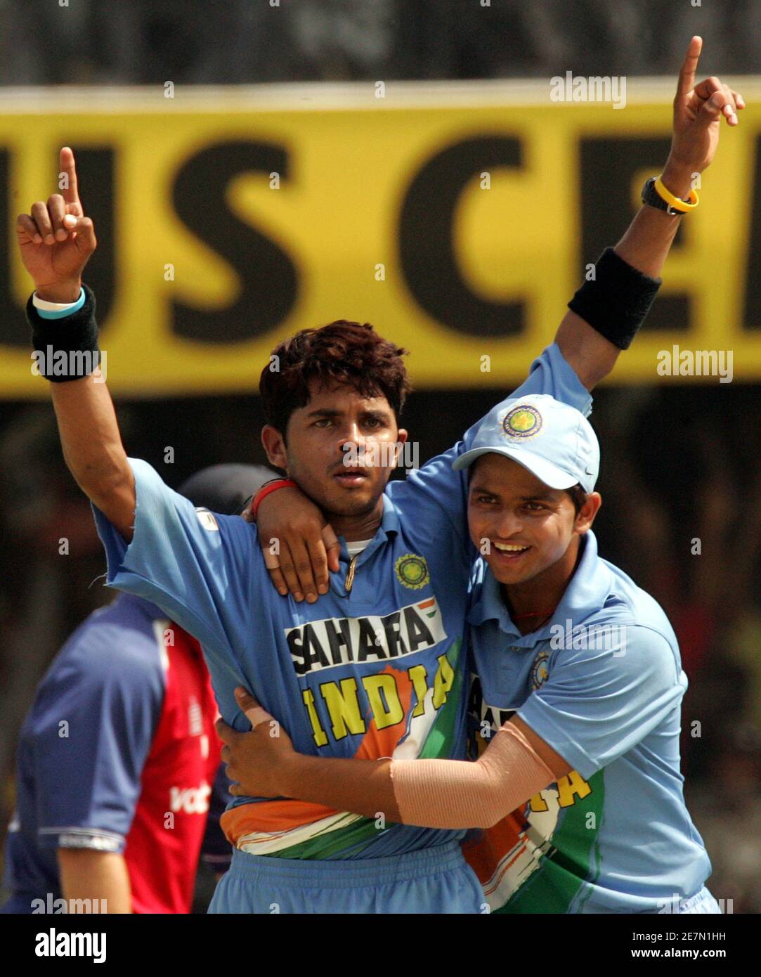 India's S. Sreesanth (L) is congratulated by team mate Suresh Raina on taking the wicket of England's Matthew Prior (not pictured) during their seventh one-day international cricket match in Indore April 15, India's S. Sreesanth (L) is congratulated by team mate Suresh Raina on taking the wicket of England's Matthew Prior (not pictured) during their seventh one-day international cricket match in Indore April 15,