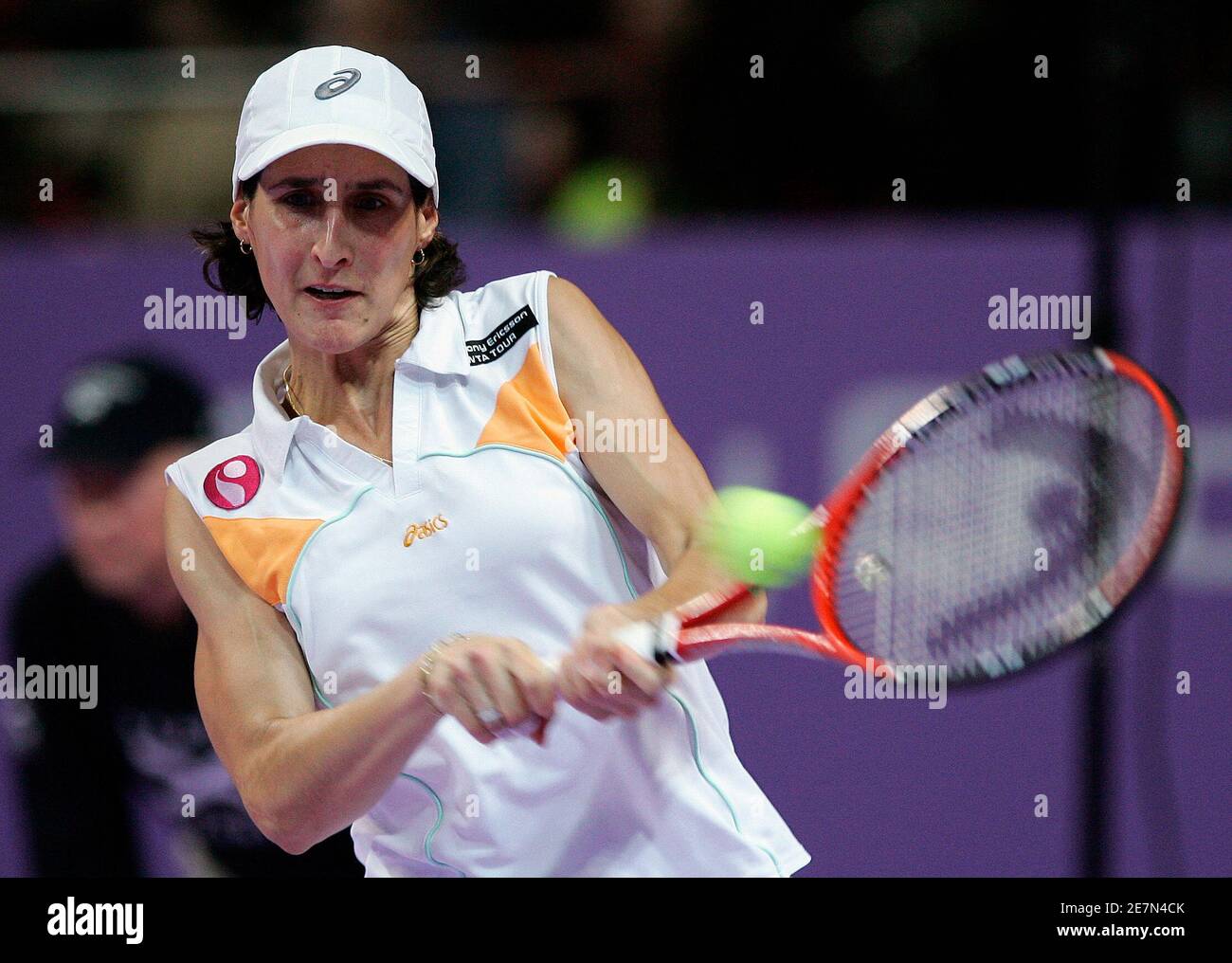 France's Virginie Razzano returns the ball to compatriot Amelie Mauresmo  during the second round of the Proximus Diamond Games tennis tournament in  Antwerp February 15, 2007. REUTERS/Yves Herman (BELGIUM Stock Photo - Alamy