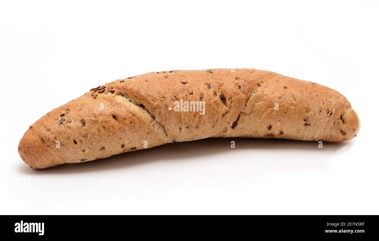 Baked whole grain bread roll on white background. Stock Photo