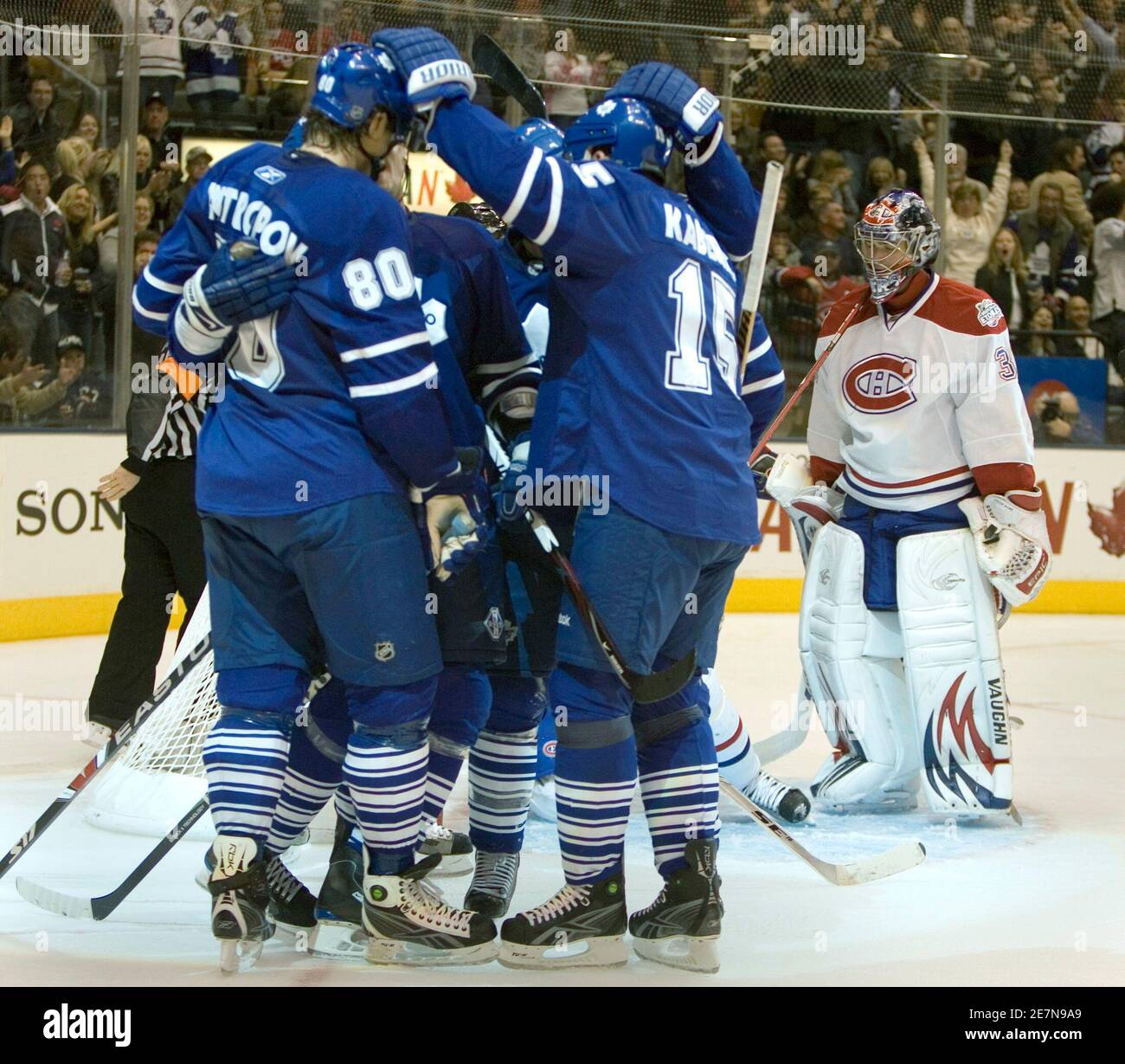 Toronto Maple Leafs celebrate their second period goal by Nik Antropov as  Montreal Canadiens goalie Carey Price skates behind them during their NHL  hockey game in Toronto, November 8, 2008. REUTERS/Fred Thornhill (