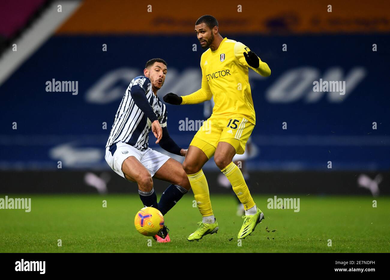 West Bromwich Albion's Jake Livermore (left) and Fulham's Ruben Loftus-Cheek (right) battle for the ball during the Premier League match at The Hawthorns, West Bromwich. Picture date: Saturday January 30, 2021. Stock Photo