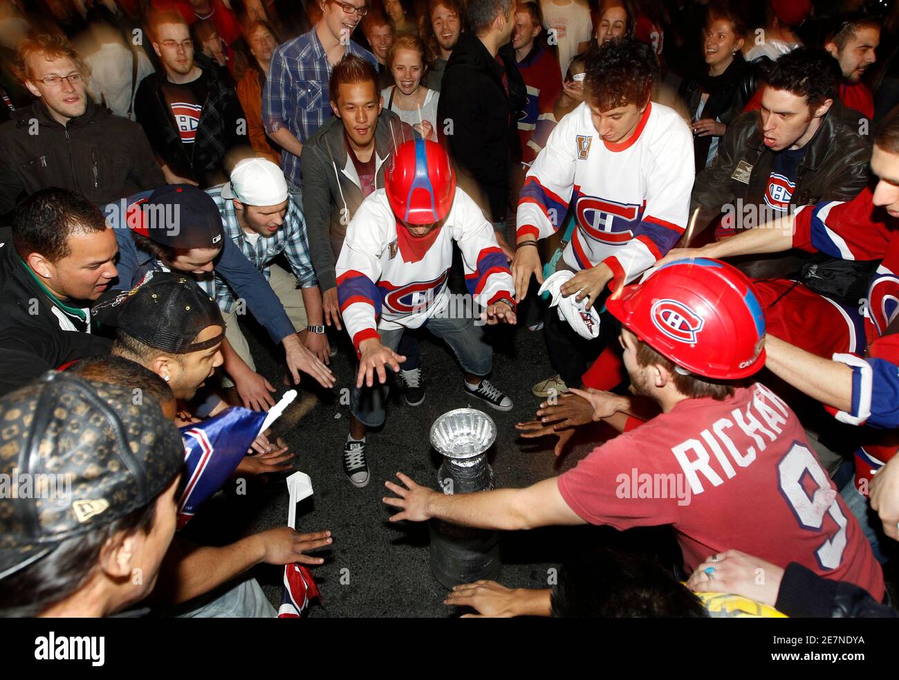 Montreal Canadiens fans gather around a 