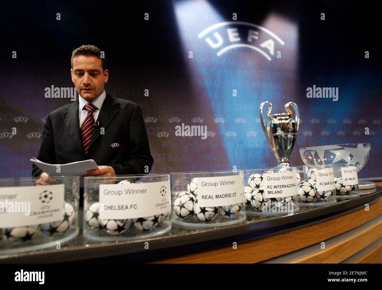 UEFA Competition manager Antonio Giachino prepares the names before the  draw of the first knock-out round of the soccer Champions League 2007-2008  at the UEFA headquarters in Nyon December 21, 2007. The