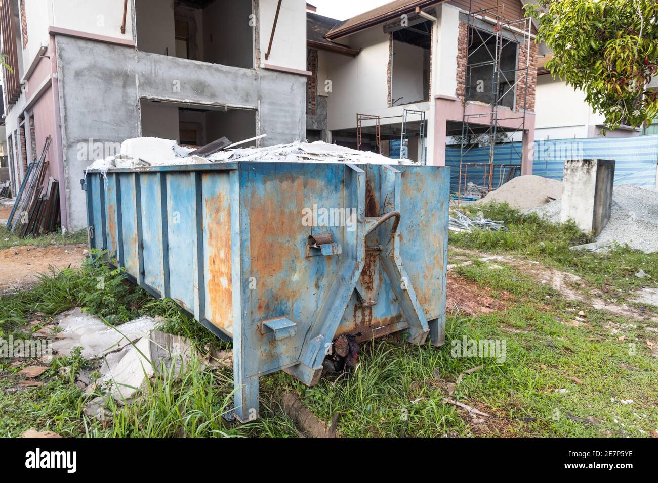 Garbage roro dumpter bin collects rubbish at construction site Stock