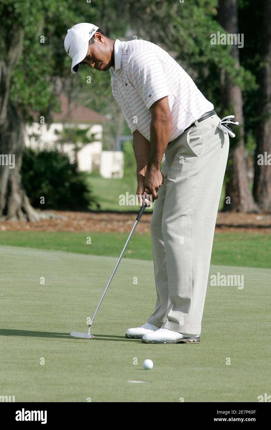 Tiger Woods watches as he misses a putt on the second green during the third round of play at The Players Championship golf tournament in Ponte Vedra Beach, Florida May 12, 2007. REUTERS/Rick Fowler (UNITED STATES) Stock Photo
