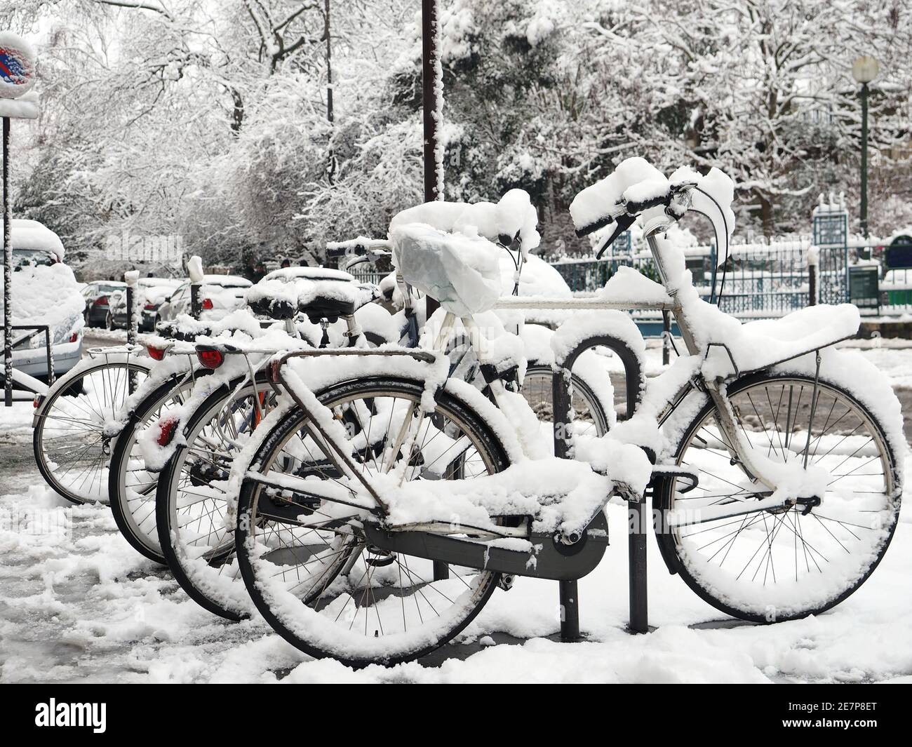 Parisian bicycles covered in snow Stock Photo