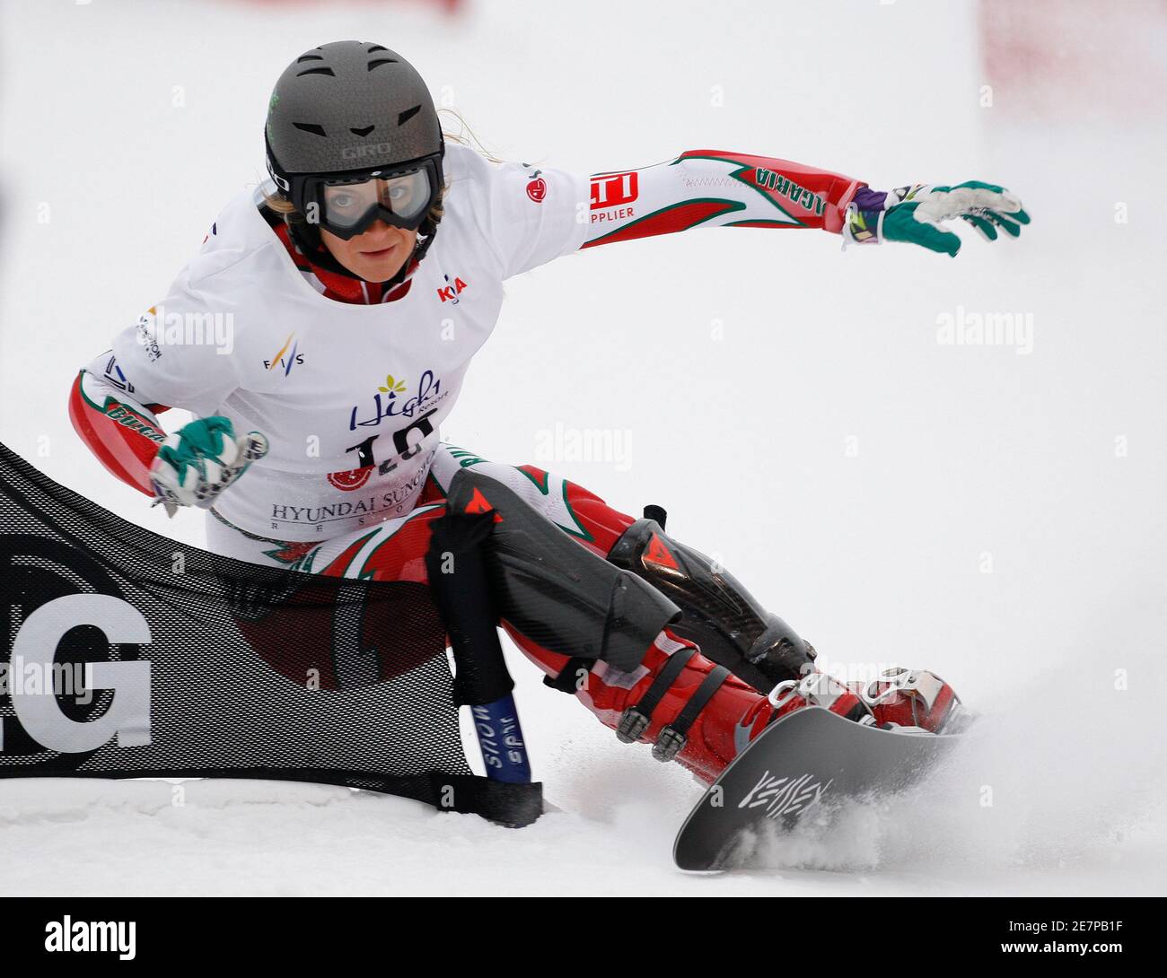 Alexandra Jekova of Bulgaria competes during the women's snowboard parallel  slalom qualification at the FIS Snowboard World Championships in  Hoengseong, east of Seoul, January 21, 2009. REUTERS/Jo Yong-Hak (SOUTH  KOREA Stock Photo -