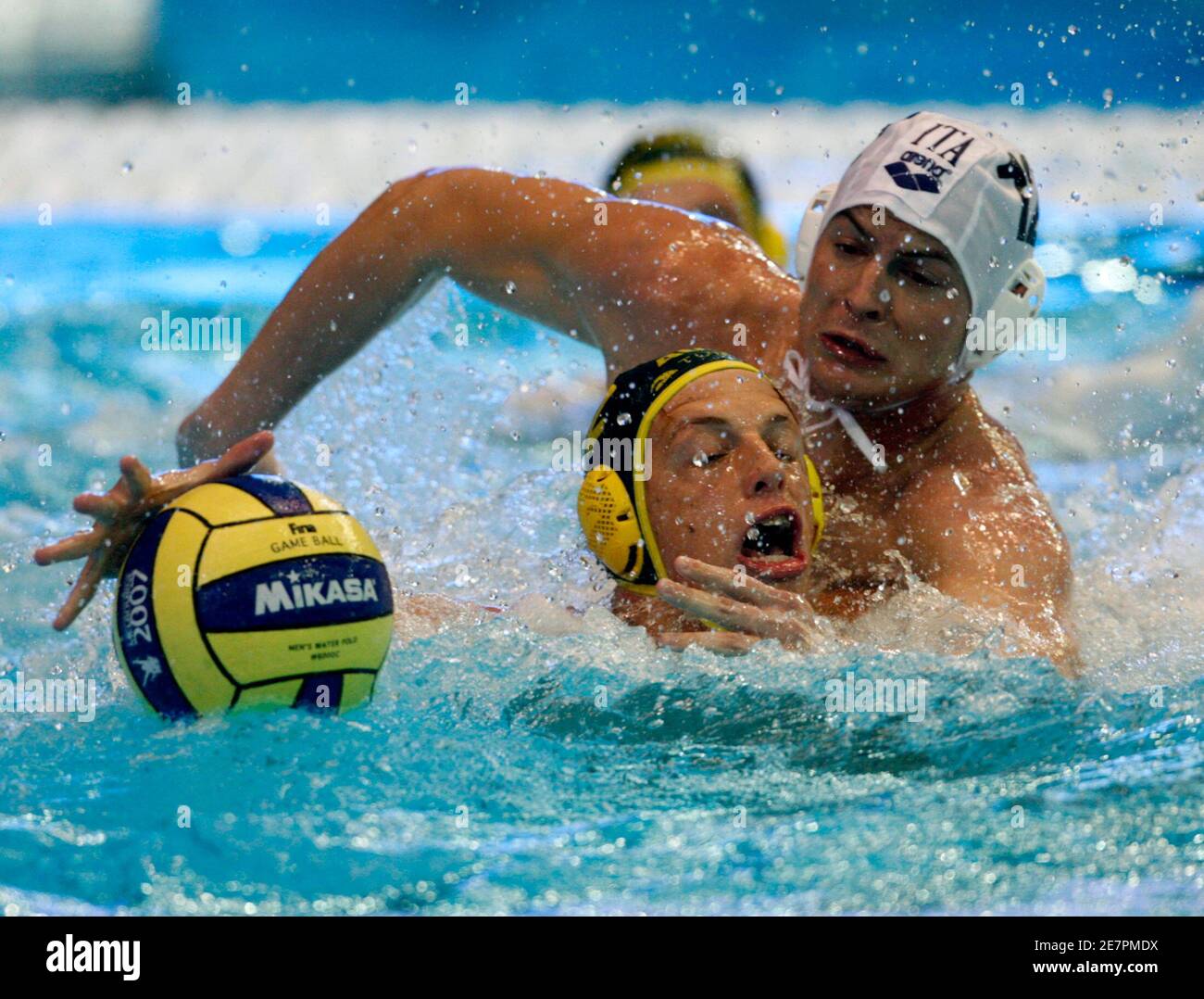 Goran Fiorentini (R) of Italy and Jamie Beadsworth of Australia fight for  the ball during their classification water polo match at the World Aquatics  Championships in Melbourne March 26, 2007. REUTERS/Laszlo Balogh (