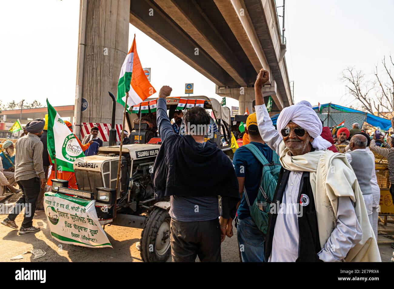huge number of tractor with indian flag going for tractor rally during farmers protest at tikri border,delhi, india. Stock Photo