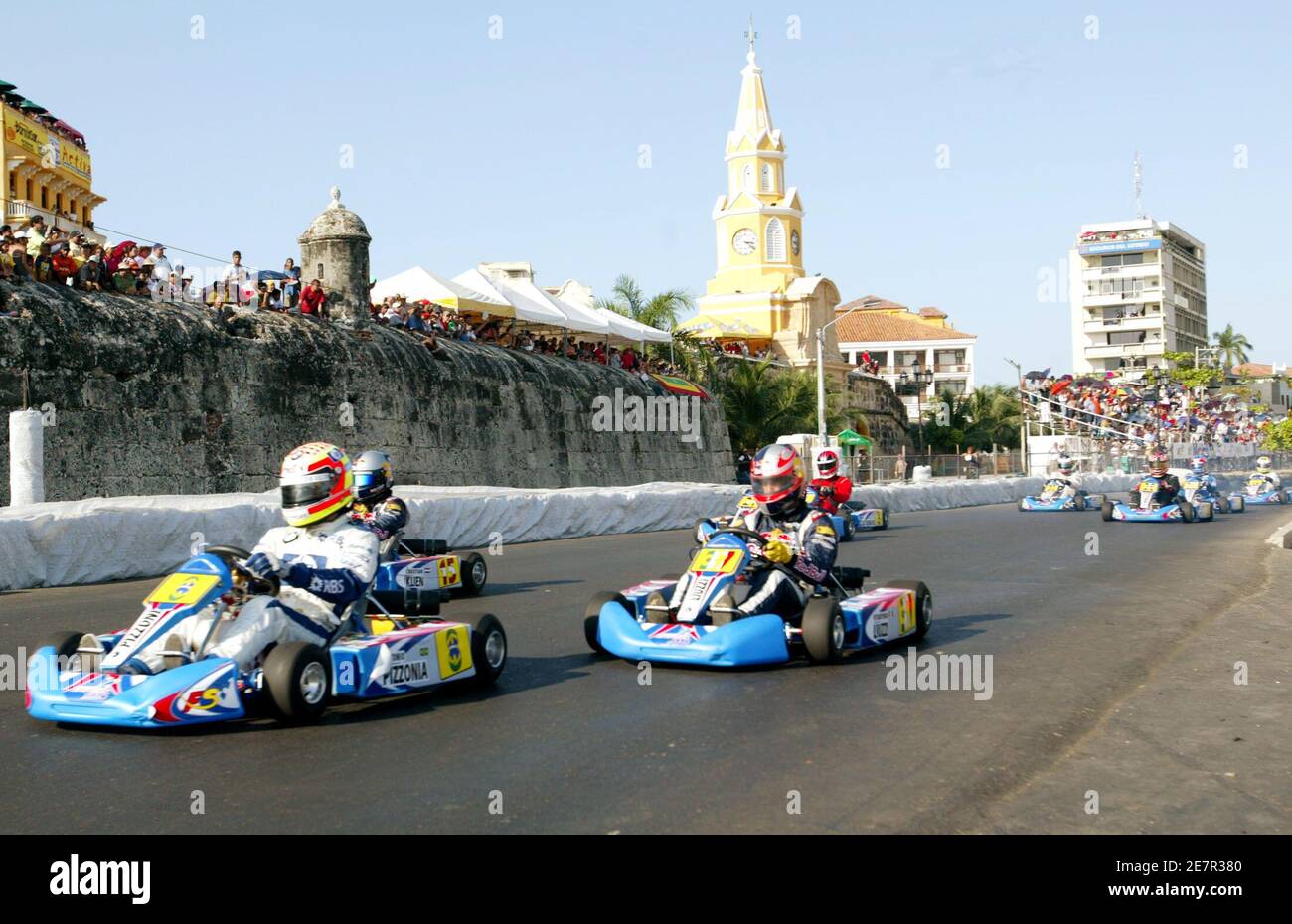Formula one and Indy Car drivers start during an exhibition cart race in the Caribbean port of Cartagena, November 6, 2005. Colombia's Formula One driver Juan Pablo Montoya organized a cart exhibition race to help children of the Formula Smile Foundation. REUTERS/Jose Miguel Gomez Stock Photo