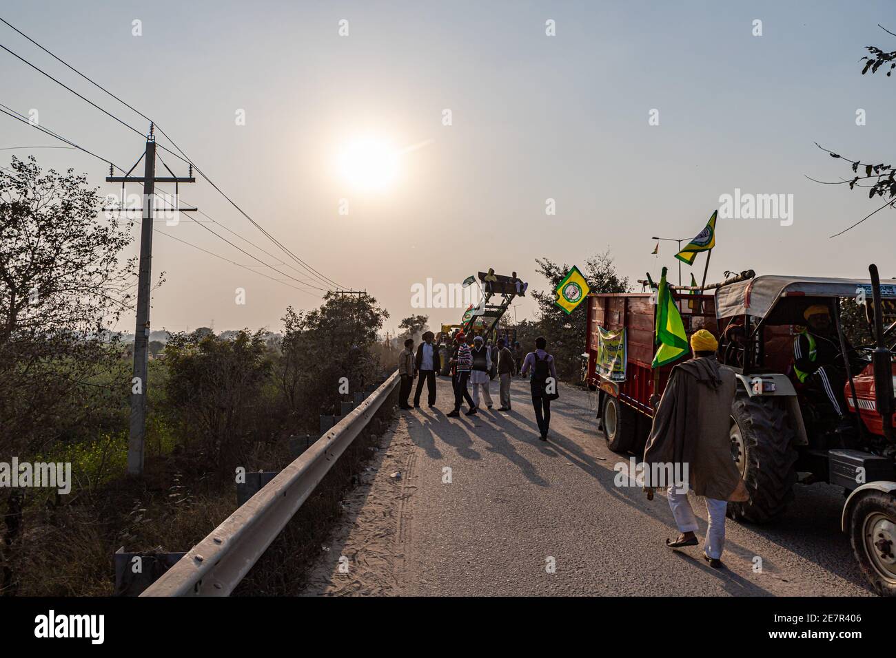 huge number of tractor with indian flag going for tractor rally during farmers protest at tikri border,delhi, india. Stock Photo