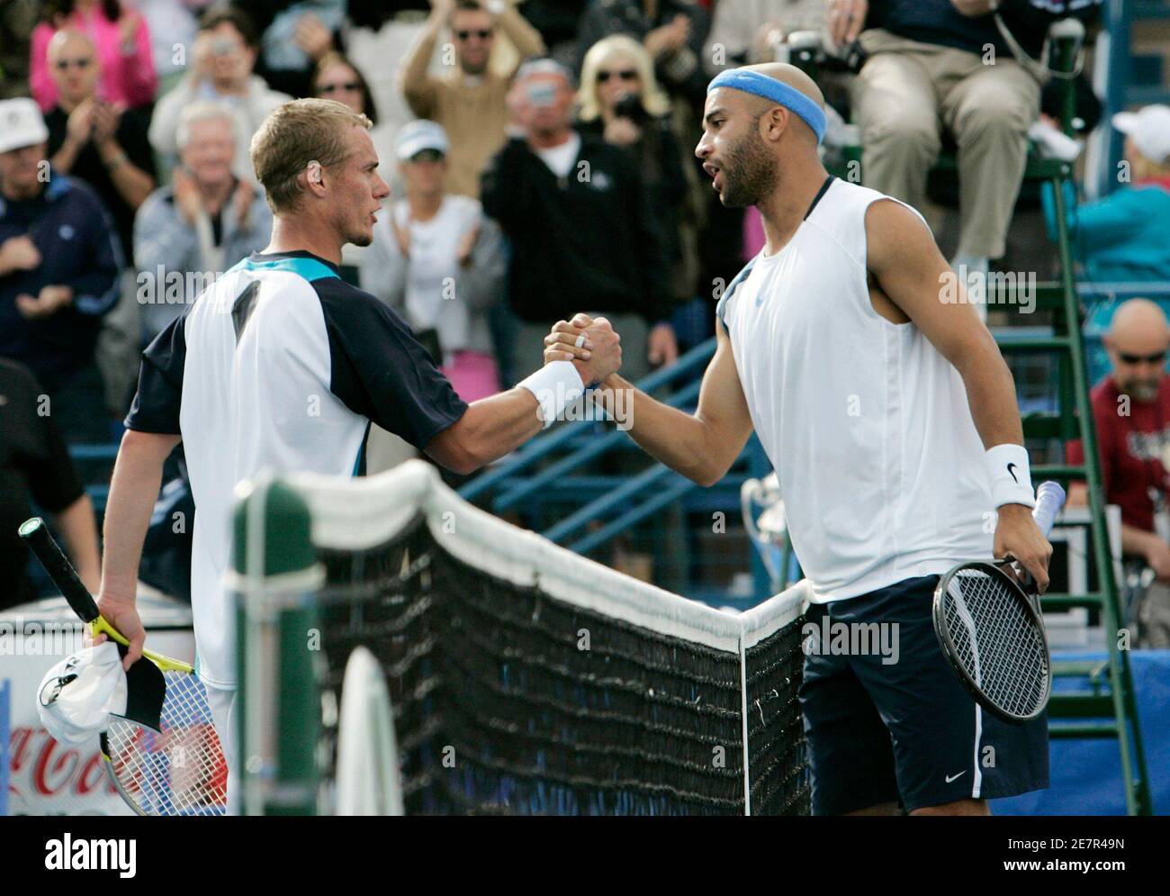 Lleyton Hewitt (L) of Australia shakes hand with James Blake of the U.S. after their men's singles final during the Tennis Channel Open in Las Vegas March 5, 2006. Blake beat Hewitt 7-5 2-6 6-3.  REUTERS/Las Vegas Sun/Steve Marcus Stock Photo