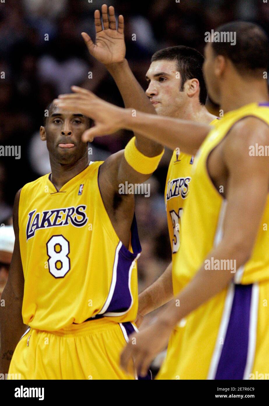 Los Angeles Lakers Kobe Bryant (L) is congratulated by teammate Devean  George (R) after Bryant scored a game-high 48 points to lead the Lakers to  a 119-93 win over the Philadelphia 76ers