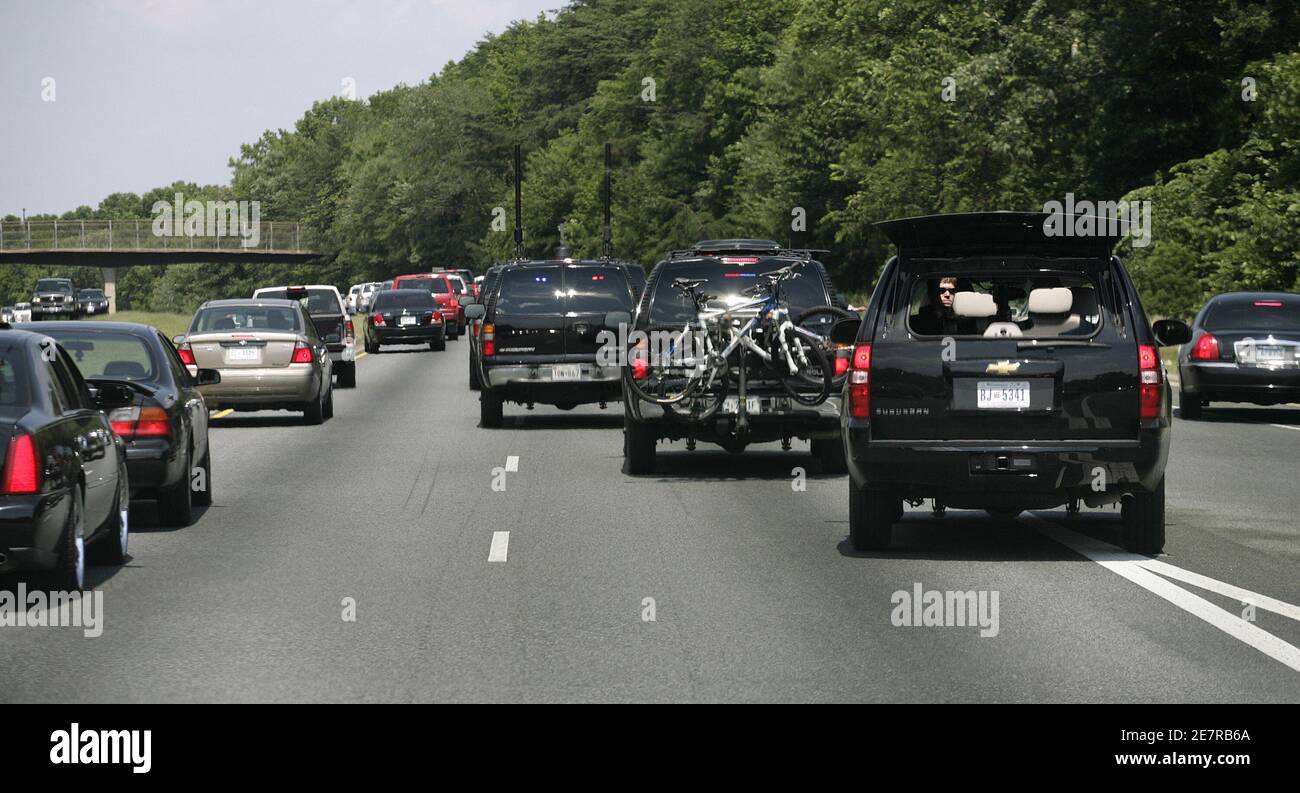 A motorcade with U.S. President George W. Bush navigates through rush-hour traffic as Bush travels for afternoon cycling in Beltsville, Maryland, July 3, 2008. REUTERS/Yuri Gripas (UNITED STATES) Stock Photo