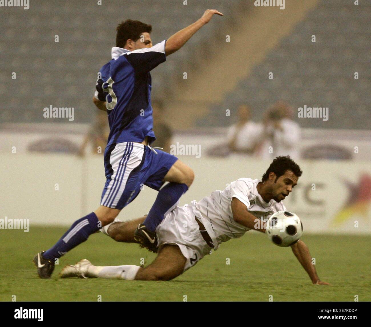 Al Shabab's Faisal Al Sultan (R) fights with Al Hilal's Meral Roodi for the ball during their Saudi King Cup qualifying soccer match in Riyadh May 11, 2009.    REUTERS/Fahad Shadeed (SAUDI ARABIA SPORT SOCCER) Stock Photo