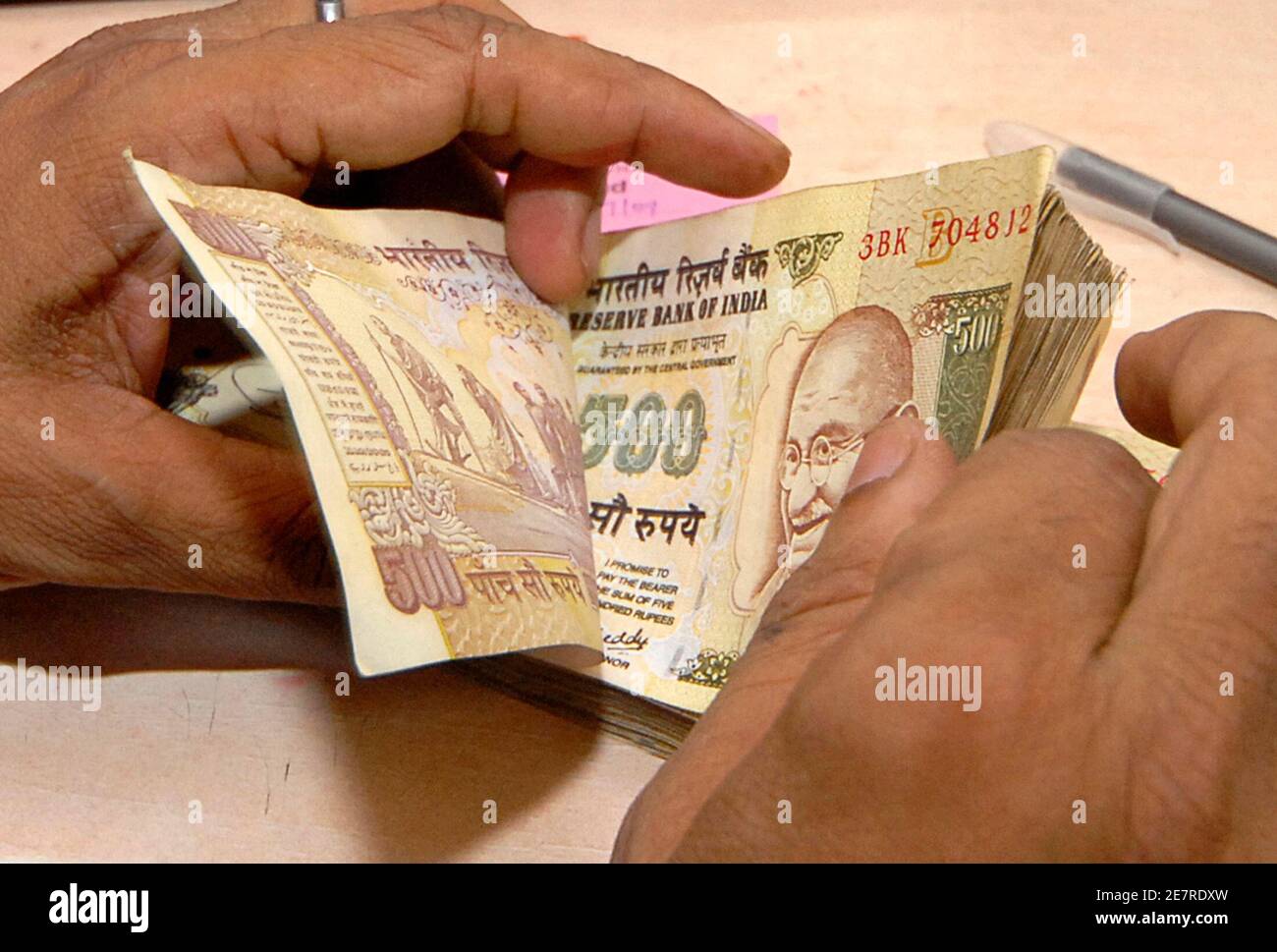 Indian bank cashier hires stock photography and images Alamy