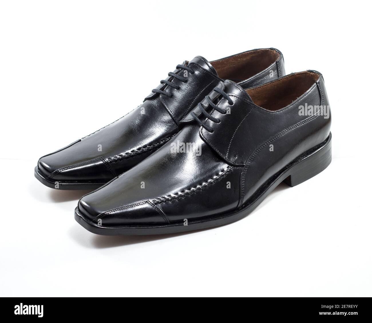 Pair of black leather men shoes isolated on white background Stock ...