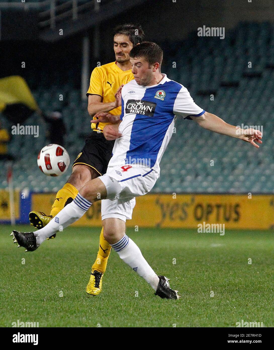 Grant Hanley (R) of Blackburn Rovers FC battles with Nikos Lyberopoulos of AEK Athens FC during their soccer match which is part of the Sydney 2010 Festival of Football at Sydney Football Stadium July 28, 2010.   REUTERS/Daniel Munoz (AUSTRALIA - Tags: SPORT SOCCER) Stock Photo