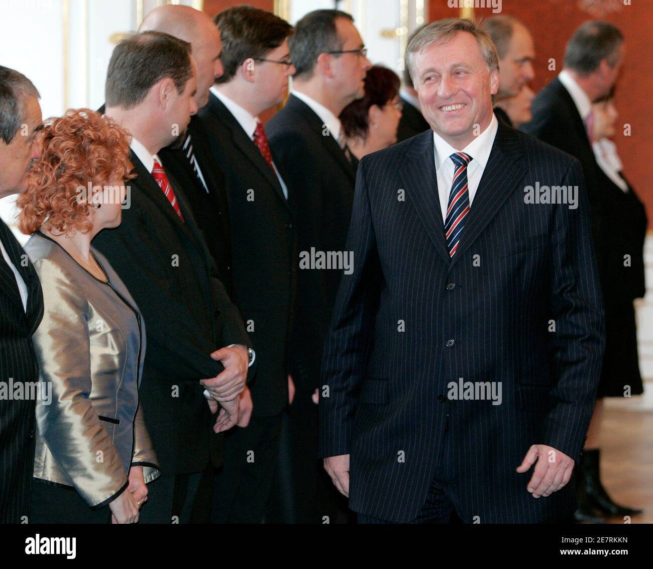 Czech Republic's Prime Minister Mirek Topolanek (R) smiles as he walks Czech Republic's Prime Minister Mirek Topolanek (R) smiles as he walks