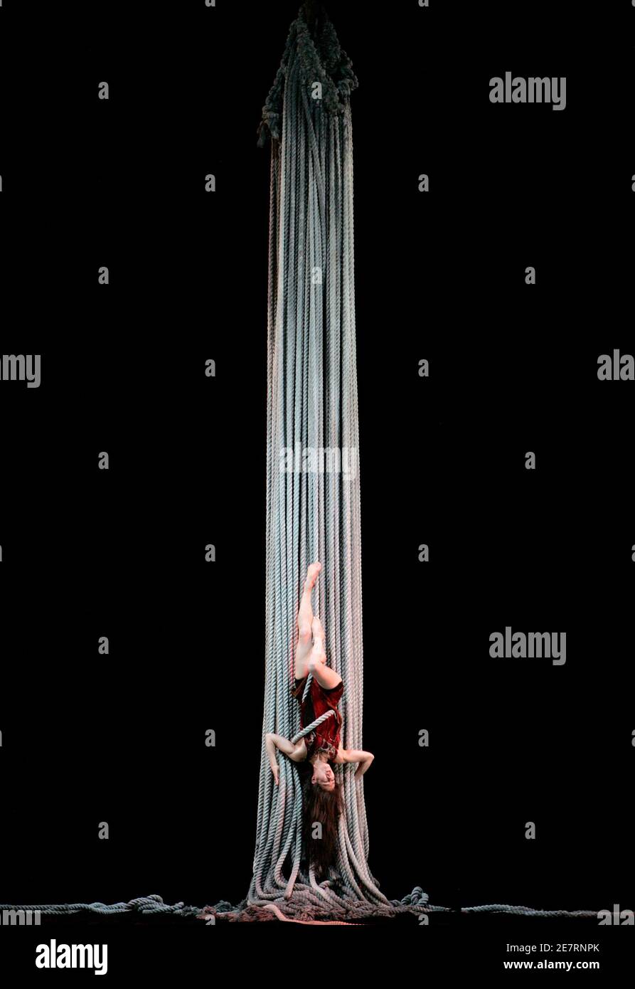 Circus performer Maria Sendow rehearses during James Thierree's performance  "Au Revoir Parapluie" ("Goodbye Umbrella") at Sadler's