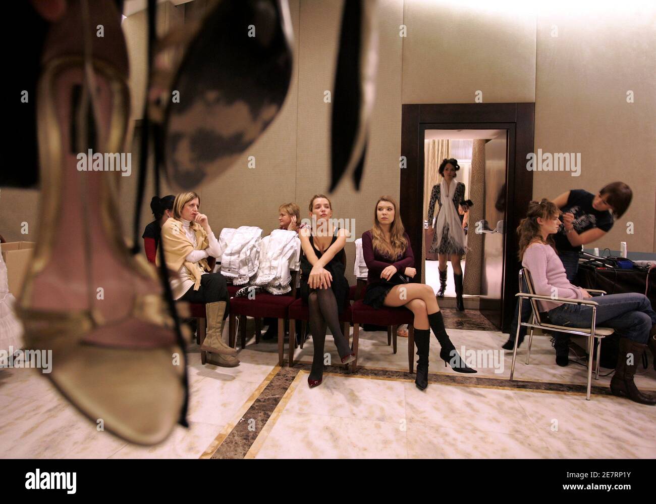 Competitors wait in the backstage for the World Top Model 2007 contest in  Budapest December 1, 2007. On its 18th edition, the World Top Model event  has been held in over 10