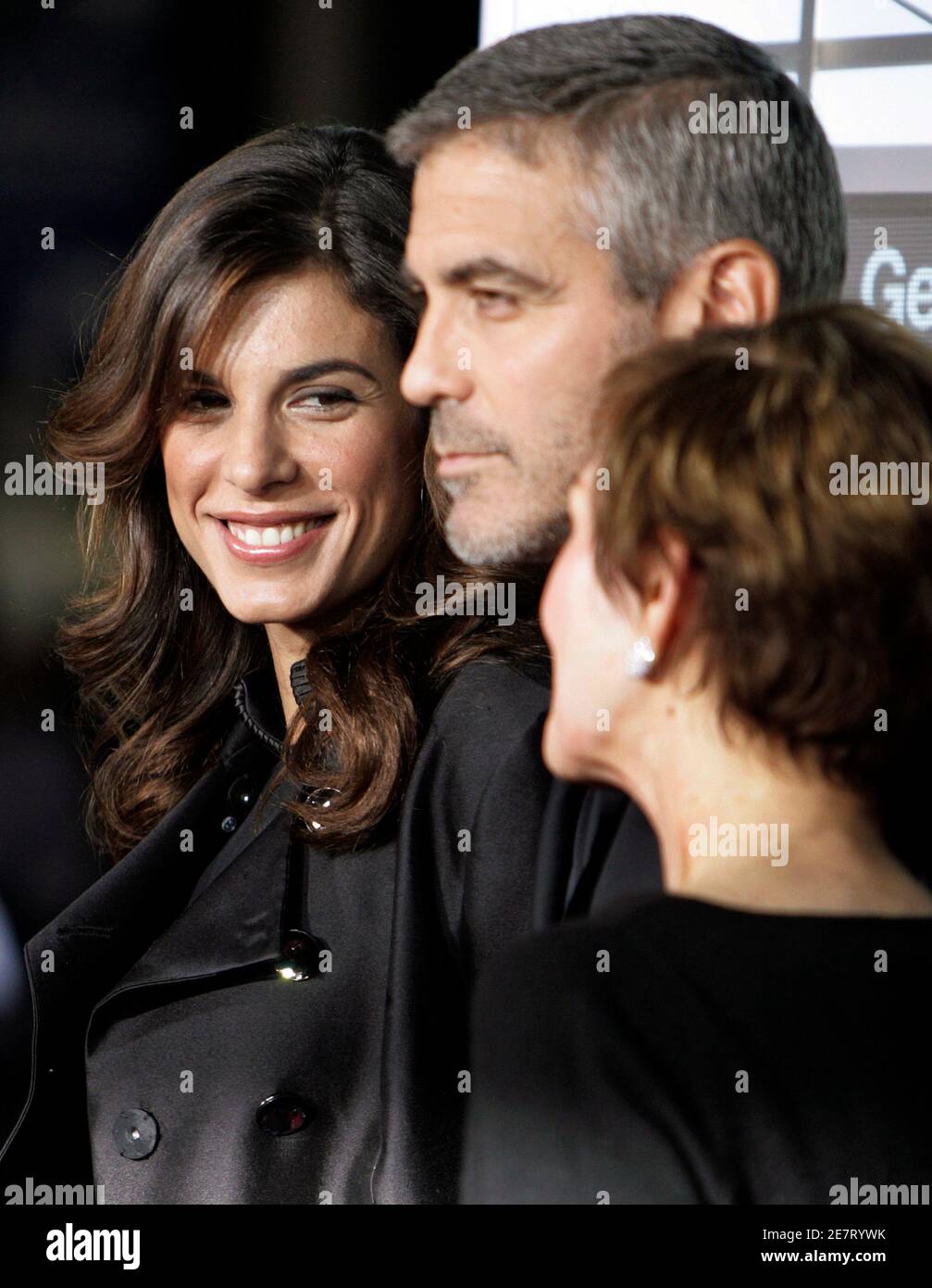 Actor George Clooney's girlfriend Elisabetta Canalis (L) poses with Clooney, star of the film 'Up In The Air' and his mother Nina Clooney at the film's premiere in Los Angeles, California November 30, 2009. REUTERS/Fred Prouser    (UNITED STATES ENTERTAINMENT) Stock Photo