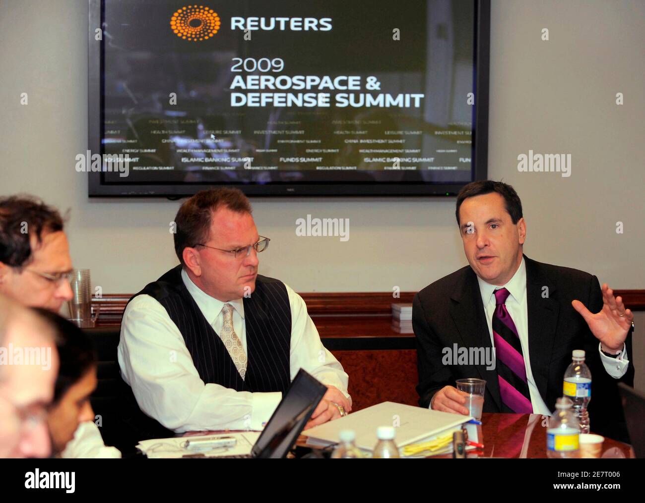 Richard Aboulafia (R), analysis vice president at research firm Teal Group, and Jim McAleese, president of McAleese & Associates, brief reporters at the Reuters Aerospace and Defense Summit in Washington December 16, 2009. The analysts gave their views on how the worldwide recession is affecting jobs, research and acquisitions in the civilian and military aerospace industries.     REUTERS/Mike Theiler   (UNITED STATES - Tags: TRANSPORT BUSINESS MILITARY) Stock Photo