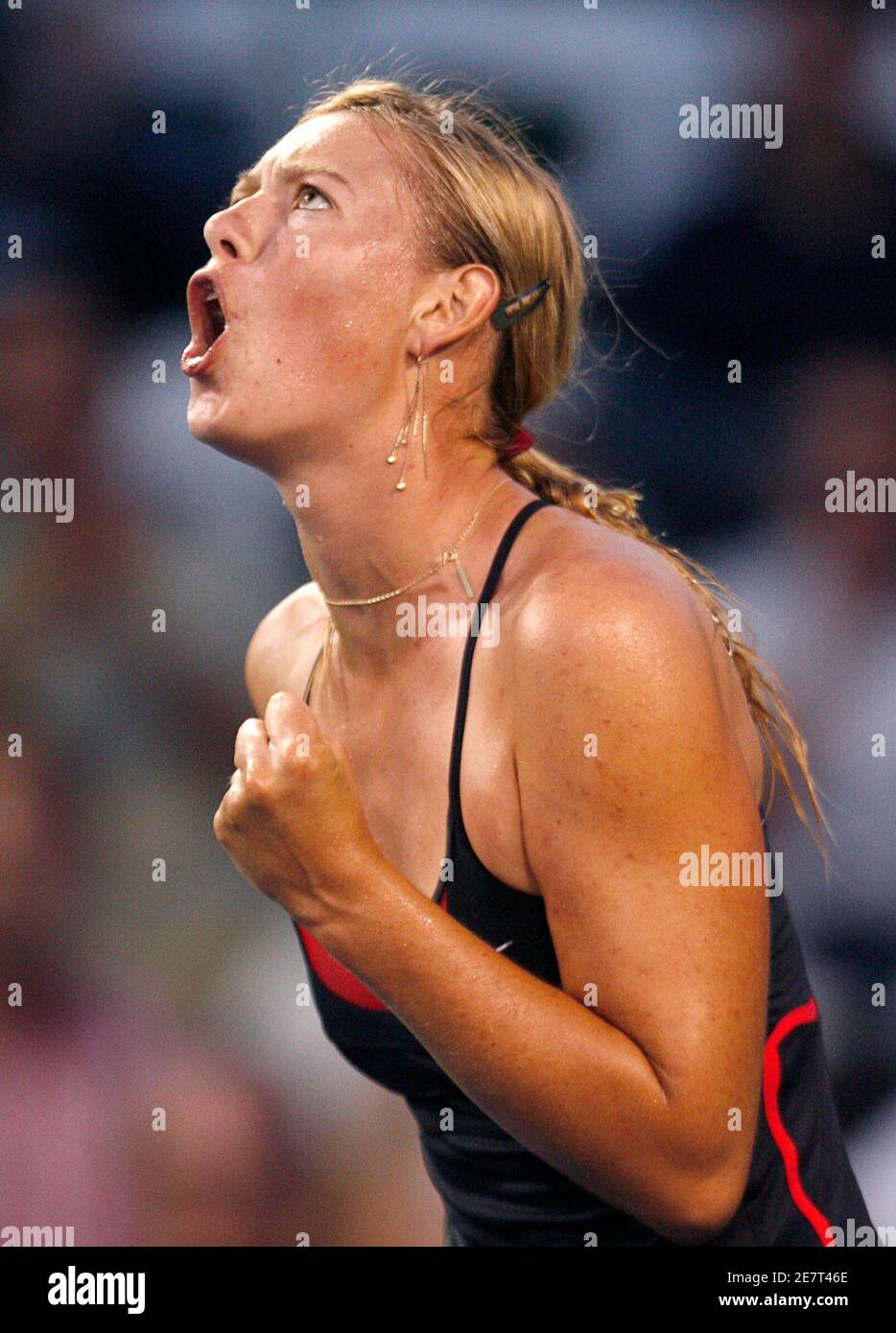 Russia's Maria Sharapova celebrates holding her serve against compatriot Vasilisa Bardina during their match at the 2006 Acura Classic women's tennis tournament in Carlsbad, California, August 1, 2006.   REUTERS/Mike Blake(UNITED STATES) Stock Photo