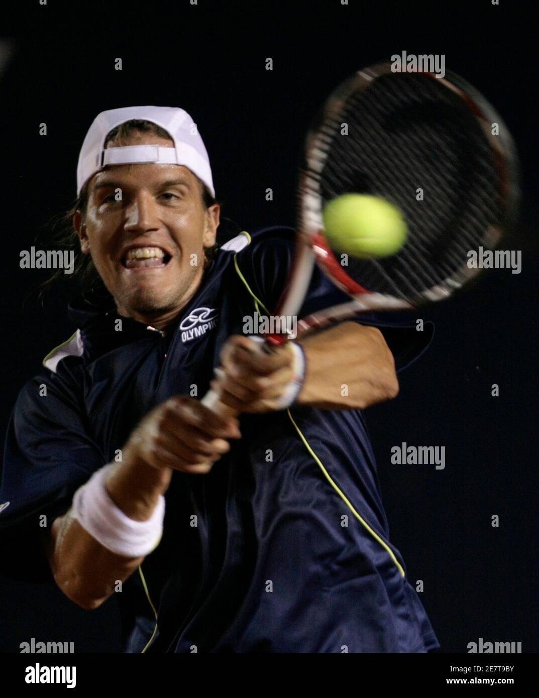 Argentina's Juan Pablo Brzezicki returns the ball to compatriot Juan Monaco during their match at the Mexican Open tennis tournament in Acapulco February 25, 2008. REUTERS/Daniel Aguilar (MEXICO) Stock Photo