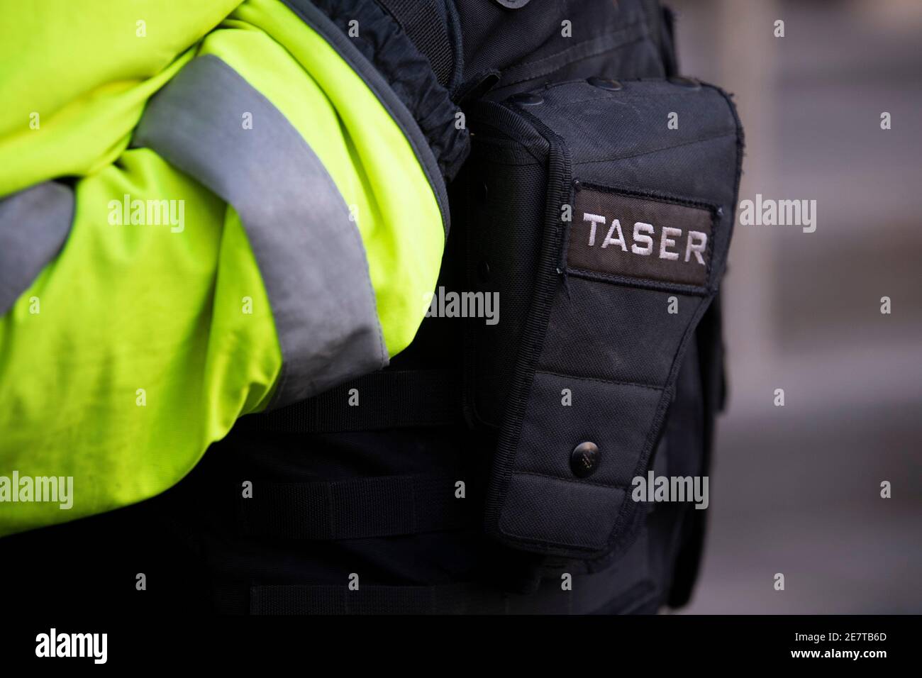 A close-up of a police taser in its pouch. Stock Photo