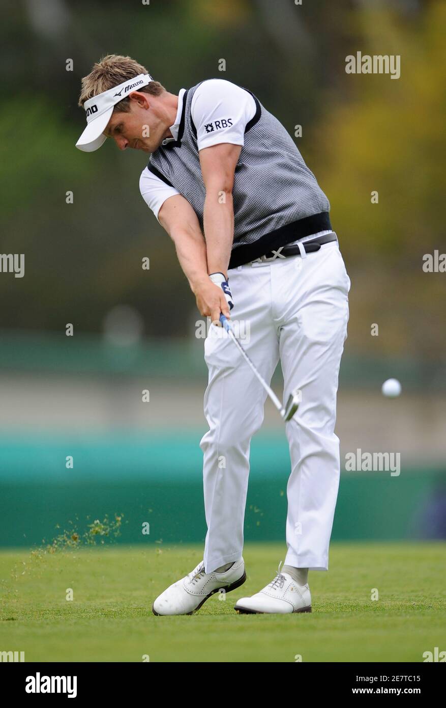 Luke Donald of England hits off the first hole fairway during the final round of the Northern Trust Open golf tournament in the Pacific Palisades area of Los Angeles February 22, 2009. REUTERS/Gus Ruelas (UNITED STATES) Stock Photo