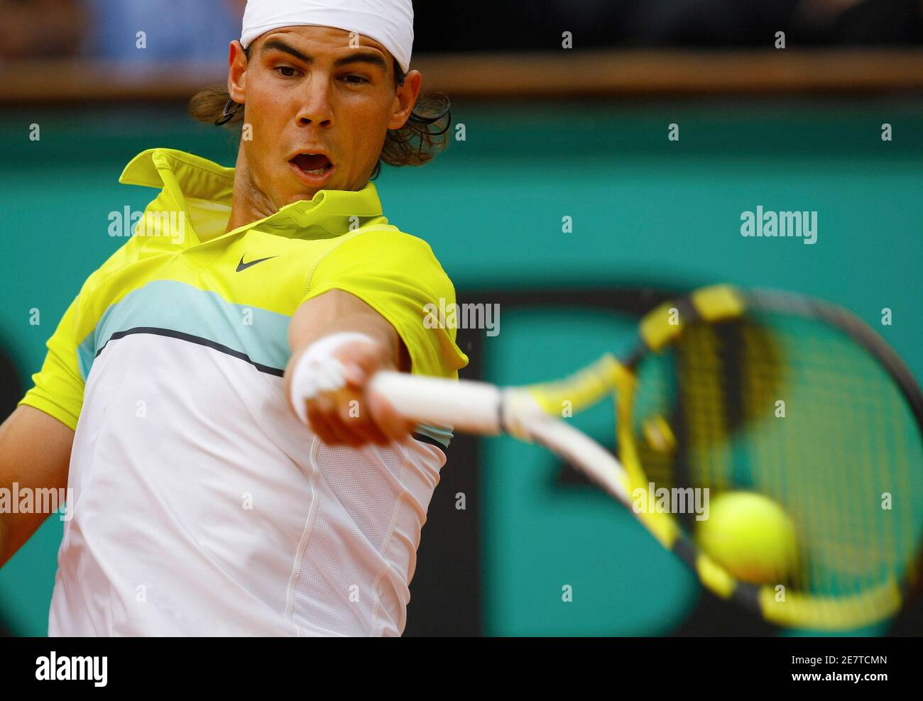 Rafael Nadal of Spain hits a return to Brian Dabul of Argentina during an  exhibition tennis match on the Philippe Chatrier court at Roland Garros,  ahead of the start of French Open