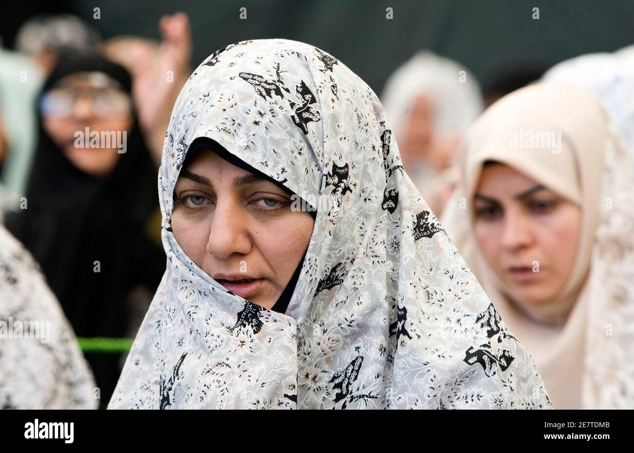 EDITORS' NOTE: Reuters and other foreign media are subject to Iranian restrictions on their ability to film or take pictures in Tehran.  Iranian women attend Friday prayers in Tehran October 2, 2009. REUTERS/Raheb Homavandi (IRAN) Stock Photo