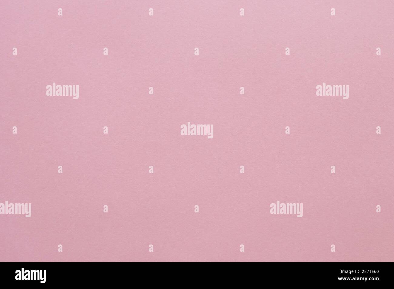 Seamless pink construction paper background wallpaper. Stock Photo