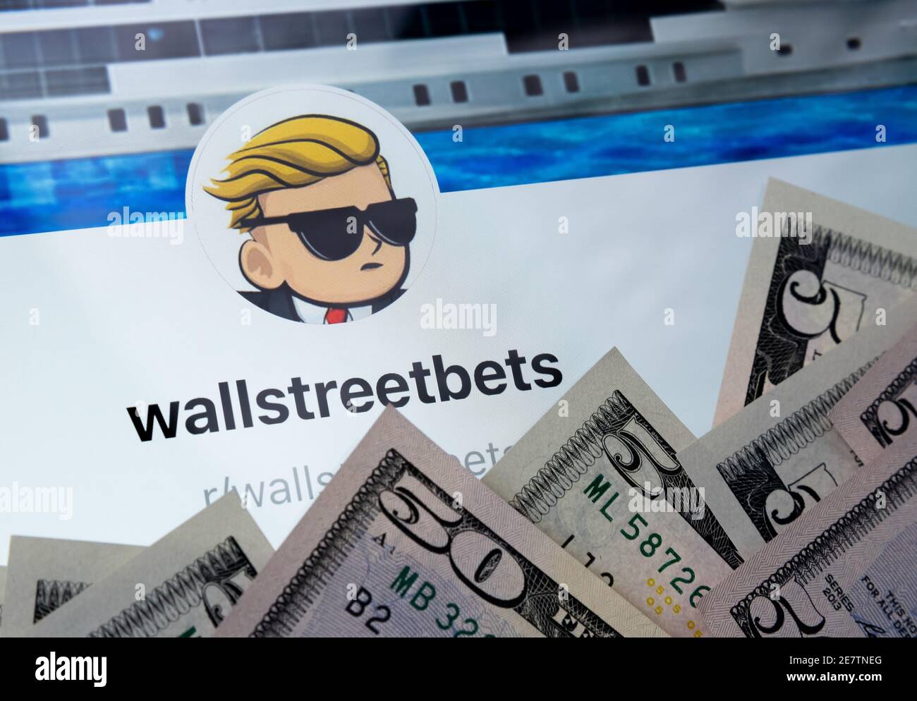Wallstreetbets Reddit community web page seen on the tablet screen  surrounded by US dollars. Concept for investment. Stafford, United Kingdom  - Januar Stock Photo - Alamy