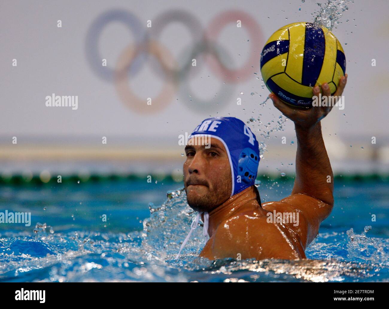 Greece's Konstantinos Kokkinakis holds the ball during their men's  preliminary round water polo match against Spain at the Beijing 2008  Olympic Games August 18, 2008. REUTERS/Laszlo Balogh (CHINA Stock Photo -  Alamy