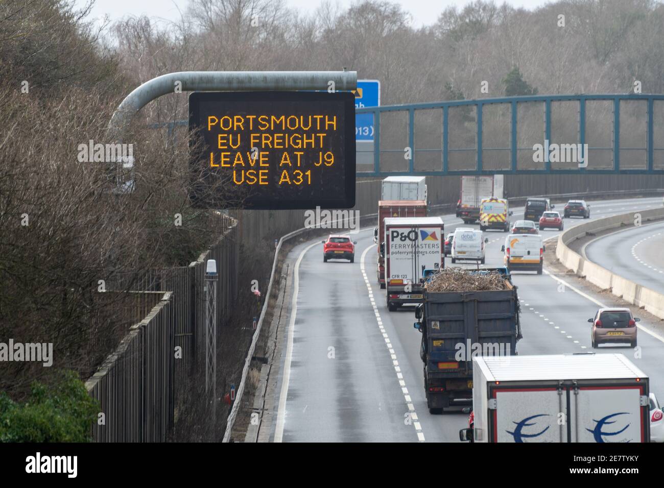 M3 Motorway sign, Portsmouth EU freight leave at J9 use A31, directions for lorries trucks heading to Europe following Brexit, January 2021 England UK Stock Photo