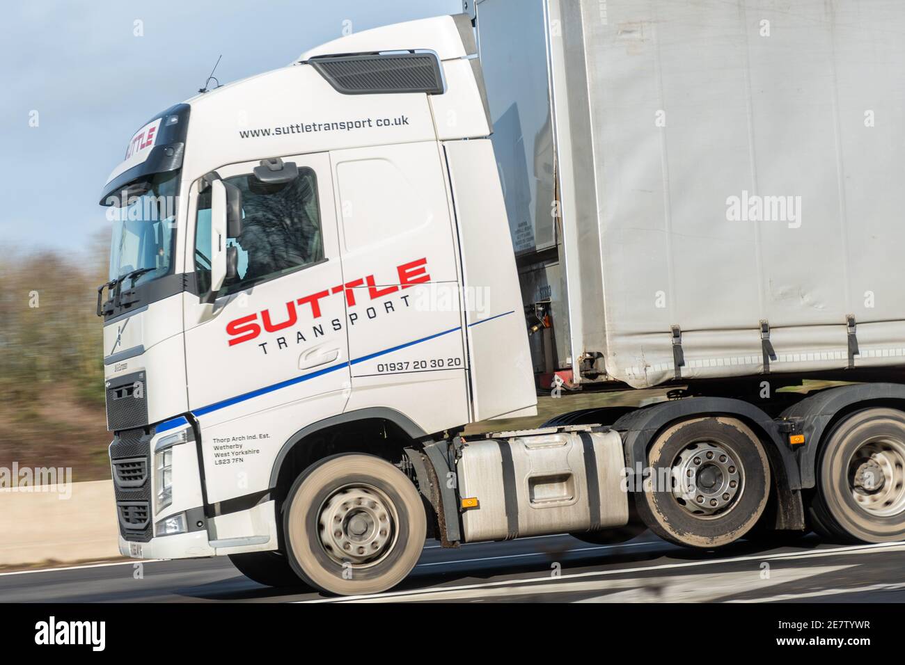 Suttle Transport lorry or truck driving on the M3, UK Stock Photo