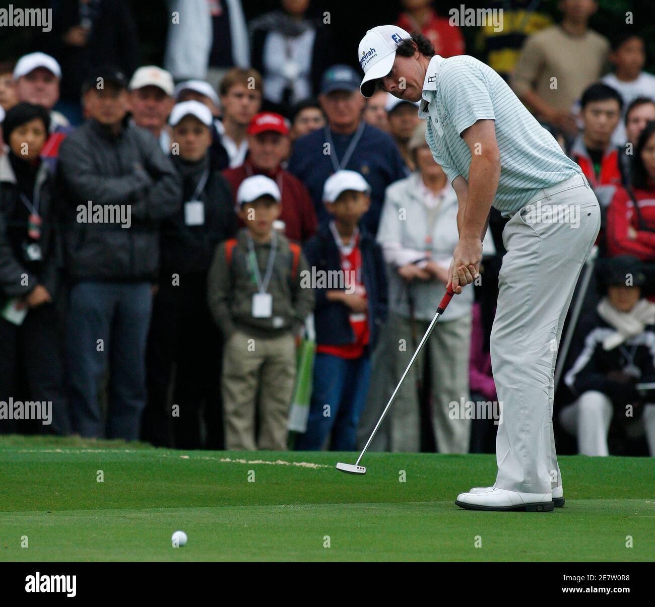 Rory McIlroy of Northern Ireland putts on the 13th green during the final round of the Hong Kong Open golf tournament November 15, 2009. REUTERS/Tyrone Siu (CHINA SPORT GOLF) Stock Photo