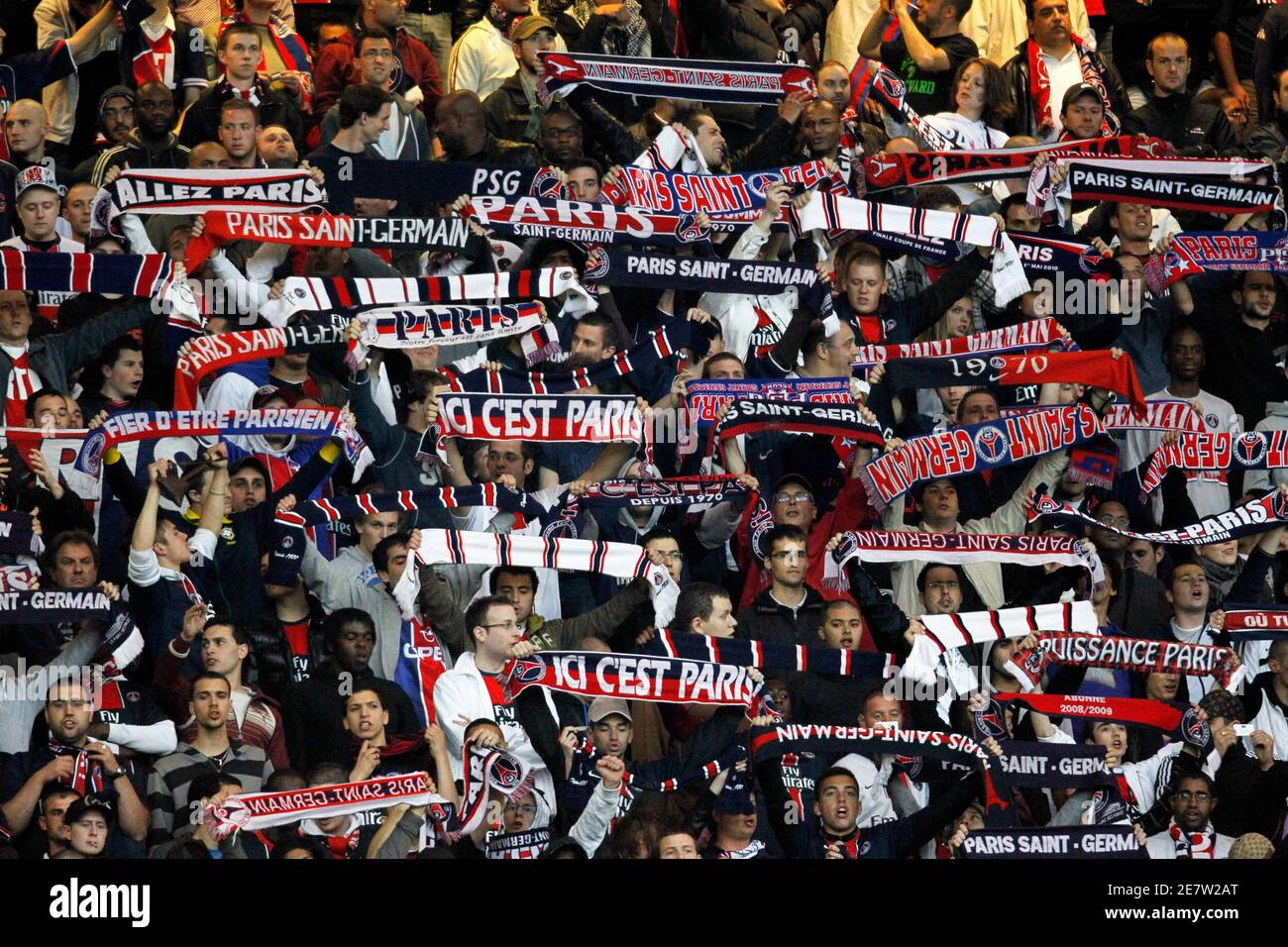 Paris Saint-Germain fans cheer their team during the French Cup final  soccer match against Monaco at the Stade de France in Saint-Denis, May 1,  2010. REUTERS/Charles Platiau (FRANCE - Tags: SPORT SOCCER